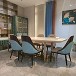 Cream White High-Gloss Dining Table with Rounded Corners and Architectural Gold Metal Bas